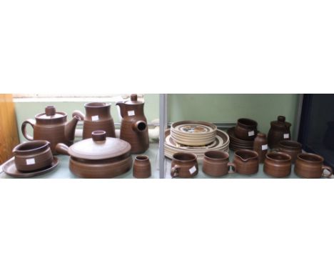 Denby - A shelf containing a selection of dinner and tea wares