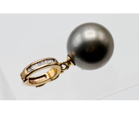 A 9ct gold diamond and pearl pendant, in an original box "Angus &amp; Coote the diamond and watch specialist".