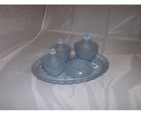 GLASS TOILET SET IN A BLUE PASTEL COLOUR EST [£10- £20]