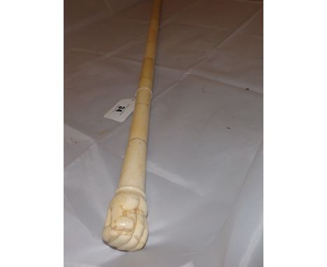 BONE WALKING STICK THE TOP WITH A CARVED FIST & SEGMENTED JOINTS 34 " LONG EST [£50-£90]