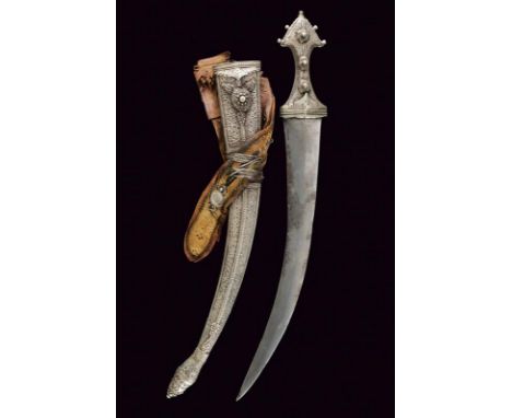 dating: Late 19th Century provenance: Arabian Peninsula, Wide, flat, curved blade with floral engravings at the base and supe