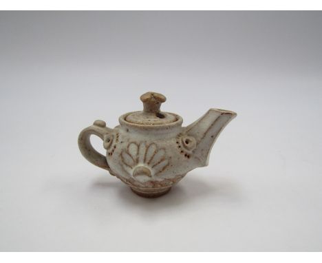 IAN GODFREY (1942-1992) A studio pottery vintage miniature teapot. 5.2cm high 