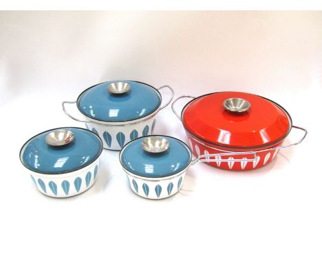 Four Catherine Holm enamel cooking pots in blue and white and larger red and white example, largest 12.5cm x 28cm diameter 