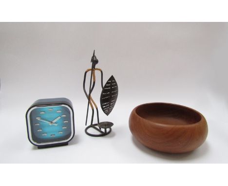 A vintage Scandinavian metal Zulu warrior candlestick and vintage teak bowl max 28cm and a coral alarm clock 