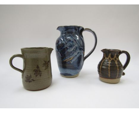 Three studio pottery jugs including Mark Griffiths, Paul Barron and Jane Mullarkey. Tallest 18cm 