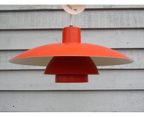 A Louis Poulsen three tiered Danish ceiling light in orange and white 