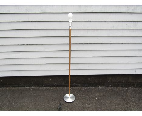 A Danish teak standard lamp on aluminium base 