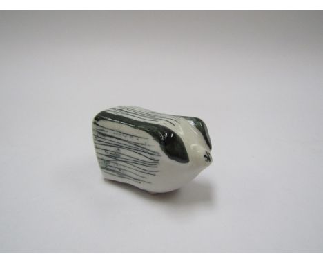 Richard and Susan Parkinson - A small ceramic pig.  3.5cm high x 6cm long  