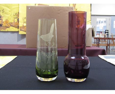 A Caithness Glass vase in green, "Warbler" by Dennis Mann and an amethyst vase. Tallest 25cm