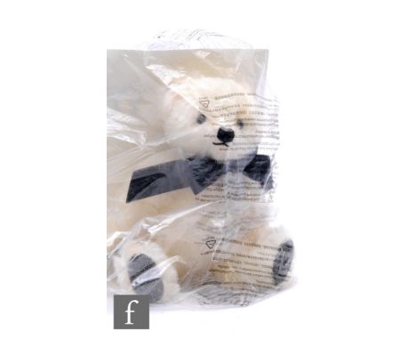 A Steiff 690938&nbsp;Black Diamond Bear, white mohair, wearing a black bow with Swarovski pendant, limited edition 529 of 250
