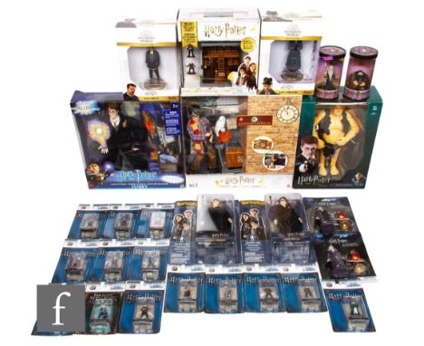 A collection of assorted Harry Potter action figures, comprising Mattel Magic Powers Harry, Mattel Platform 9 3/4, PopCo Graw