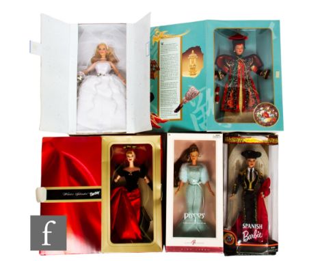 A collection of Mattel Barbie dolls, Winter Splendor, Blushing Bride, Chinese Empress, Spanish Barbie and Pisces, all boxed. 