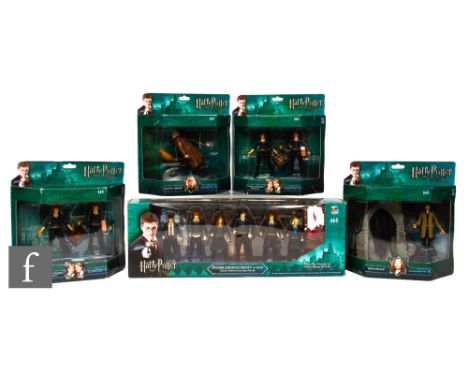 A collection of Popco Harry Potter action figures, Dumbledore's Army Exclusive Collectors Action Figure Box Set, two Deluxe F