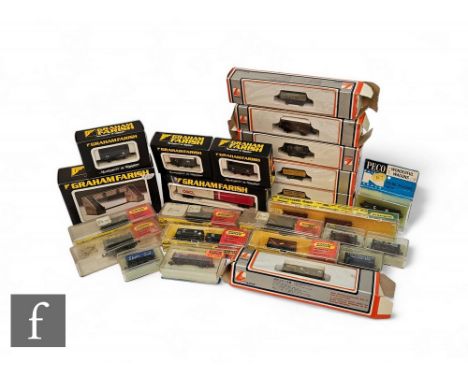 A collection of N gauge rolling stock by Lima, Graham Farish, Hornby Minitrix and Peco, together with a Graham Farish Footbri