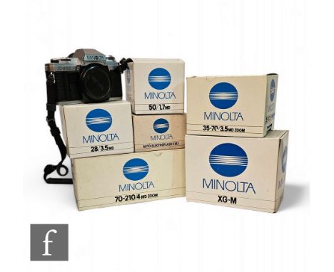 Various Minolta cameras and accessories, to include X-300, XG-M and boxed lenses including f28/3.5, f50/1.7, 70-210 4MDZoom, 