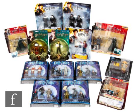 A collection of Harry Potter action figures, five Mattel Mini Collection, two Popco Order of the Phoenix, two Popco Order of 