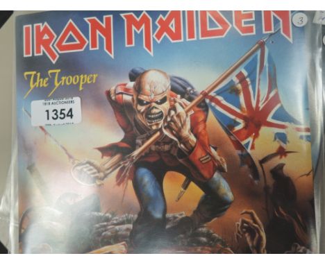 SMALL LOT OF IRON MAIDEN SEVEN INCH SINGLES - 2 PICTURE DISCS AND A COLOURED VINYL WITH POSTER - EX CONDITION 
