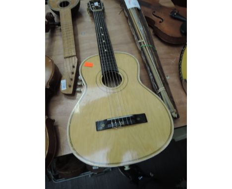 A vintage Chinese student guitar