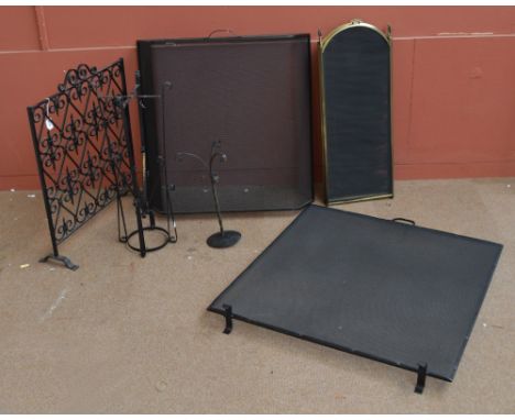 A contemporary fire screen, another, companion tools, etc.