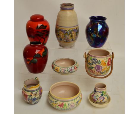 Six pieces of Poole Pottery including a jug, vases, bowls, all signed to base by artist, a Poole ginger jar and cover in "Afr