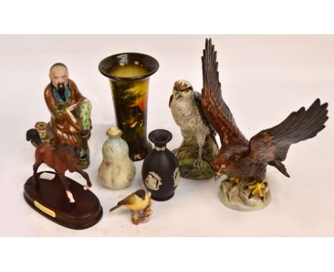 Two Beswick figures; golden eagle, no.2062 and a liqueur bottle modelled as an eagle by D Lyttleton, a small Royal Worcester 