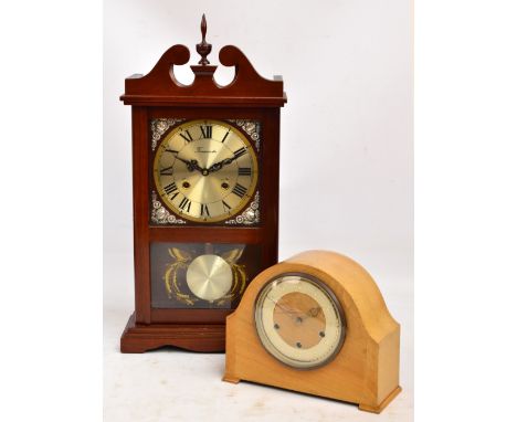 An Art Deco walnut cased Smiths eight day chiming mantel clock, height 22cm, and a modern Timemaster mantel clock (2).