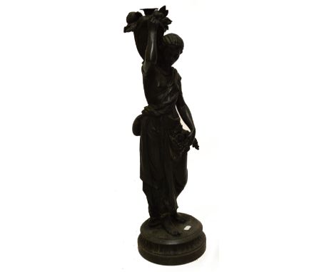 A late 19th century French cast iron figural lamp.