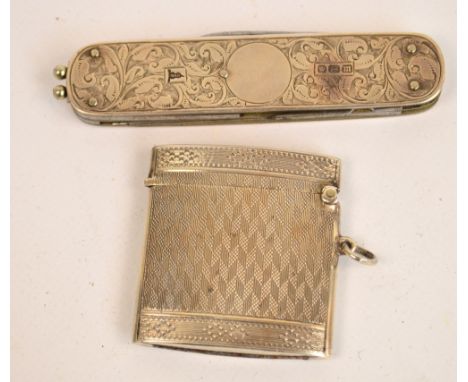 A George V hallmarked silver rectangular vesta case with engine turned decoration, Birmingham 1922, 4.8 x 4.4cm, also a silve