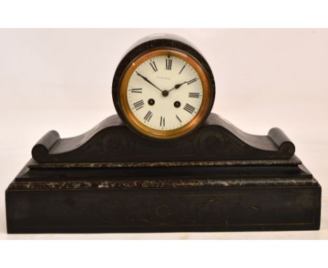 A large decorative mantel clock.