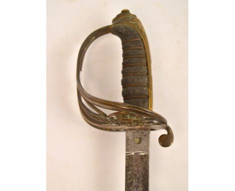 A Victorian officer's dress sword with shagreen wirework grip, pierced knuckle guard and blade inscribed "Manning & Co. 124 N