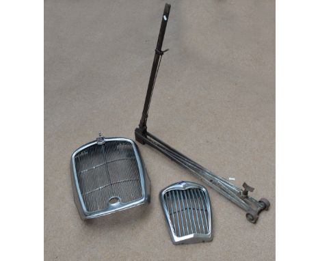 A vintage radiator grill for a Morris 14, another for a Riley, and a large jack (3).