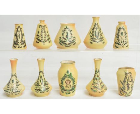 A collection of Locke & Co. Worcester blush ivory crested ware miniature vessels of various shapes and sizes, in mirror desig