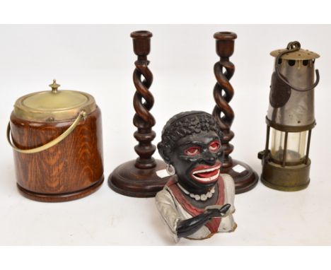 A Dinah money bank, a miner's lamp, and pair of oak barleytwist candlesticks, and an oak and silver plate mounted biscuit bar