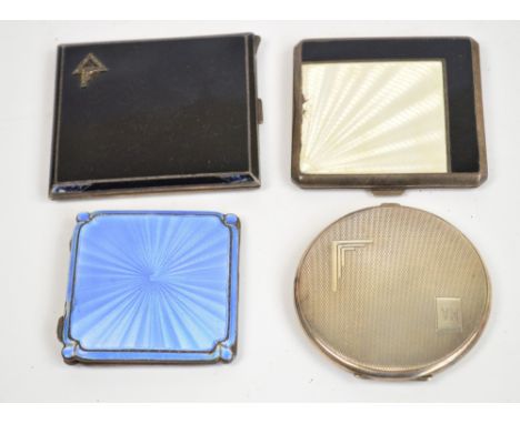 Two Art Deco silver and enamel decorated ladies cigarette cases, a silver and guilloche enamel compact, and a further silver 