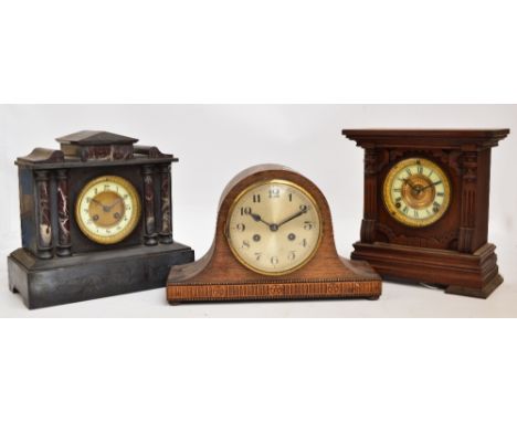 A late 19th century French black slate mausoleum type mantel clock, width 30cm, a c.1900 mantel clock with circular dial, hei