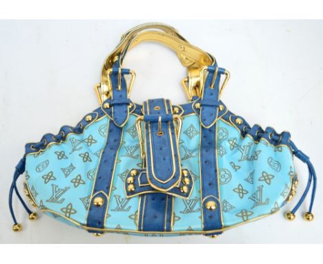 LOUIS VUITTON; a limited edition turquoise monogram suede ostrich Theda GM handbag, numbered to the interior 92575. CONDITION