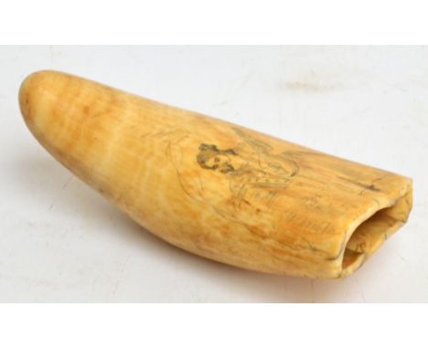 A scrimshaw whale's tooth, engraved with a woman playing a mandolin, length 14cm. CONDITION REPORT: Scratches throughout, som
