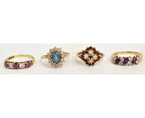 A 9ct yellow gold five stone dressing ring with rubies alternating with white stones, similar example with amethyst and two c