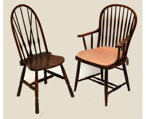 A set of four elm seated stick back chairs and a similar elbow chair (5).