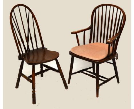 A set of four elm seated stick back chairs and a similar elbow chair (5).