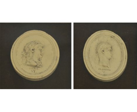 An early 20th century circular oak barometer and a pair of Grantor style small oval busts, framed and glazed (3).