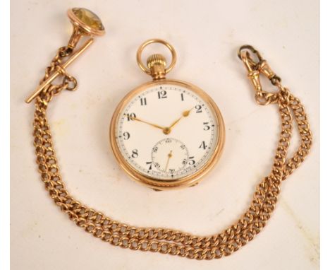 A 1920's 9ct gold cased open faced crown wind pocket watch with circular white enamel dial set with Arabic numerals and subsi