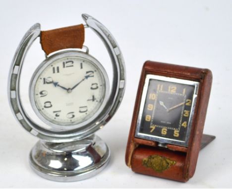 A 1930's/40's leather cased chrome plated Jaeger LeCoultre travel clock with black dial and illuminating Arabic numerals, ret