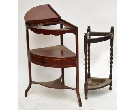 A Georgian mahogany and line inlaid three tier corner wash stand with central drawer and an oak corner stick stand on barley 