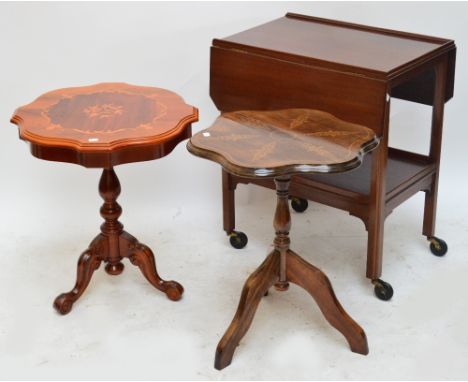 A mahogany two tiered trolley and two reproduction tripod occasional tables.