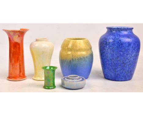 RUSKIN; a group of five vases; a blue crystalline glazed vase of baluster form, impressed marks to base, dated 1930, height 2