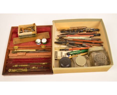 A mixed lot of writing equipment including various fountain pens, dip pens, pencils and propelling pencils including some sil
