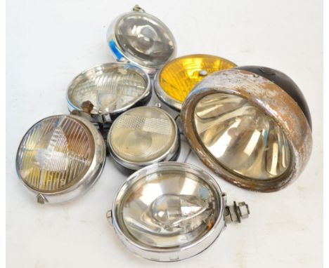 Seven various vintage motoring lamps including a Lucas Ranger, Lucas Fog Ranger, Stadium, Discus, etc.