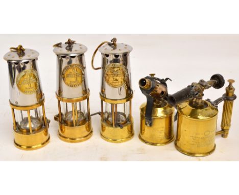 Three miner's lamps by The Protector Lamp and Lighting Company Ltd, Eccles, two inscribed "Type 6 M&Q Safety Lamps, Approval 