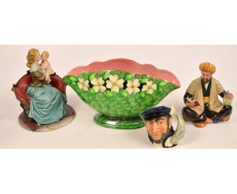 A Royal Doulton figure; HN2247 "Omar Khayyam", a small Royal Doulton character jug; D6506 "Capt Ahab", a Maling planter and a